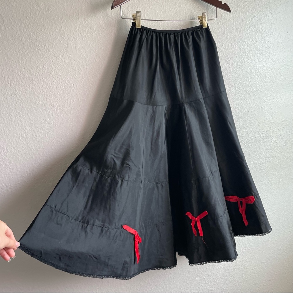 1950s crinoline skirt with adorable red ribbon bow details